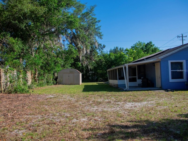 15 Estrella Rd, Debary, FL 32713 - view of green lawn with a sunroom