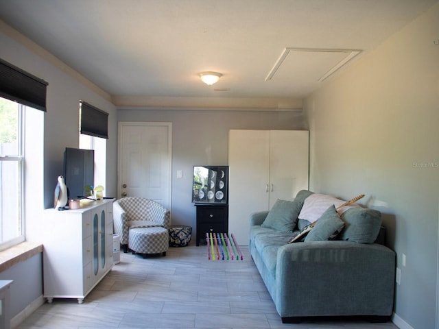 15 Estrella Rd, Debary, FL 32713 - living area featuring attic access and baseboards