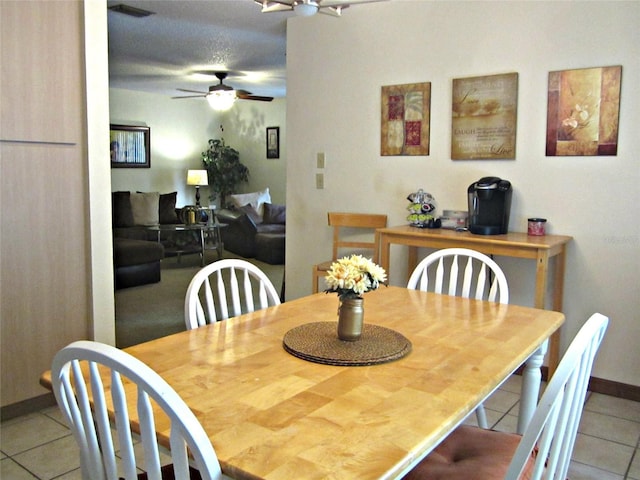 2073 Oak Meadow Cir S, Daytona, FL 32119 - dining area featuring visible vents, tile patterned floors, baseboards, and ceiling fan
