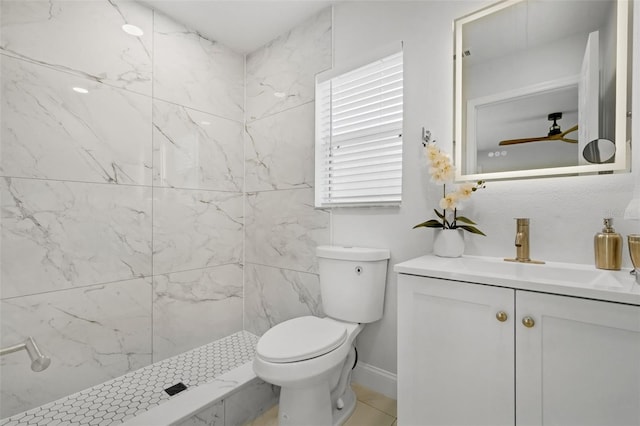 969 Commerce Rd SE, Palm Bay, FL 32909 - full bathroom with toilet, a tile shower, vanity, and a ceiling fan
