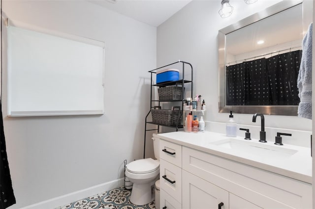 full bathroom featuring vanity, curtained shower, tile patterned floors, toilet, and baseboards