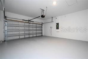 1163 James Paul Rd, Davenport, FL 33837 - garage featuring electric panel