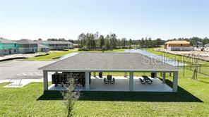 1163 James Paul Rd, Davenport, FL 33837 - surrounding community featuring a gazebo and a yard
