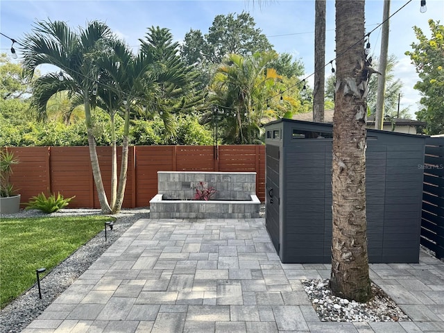view of gate with fence