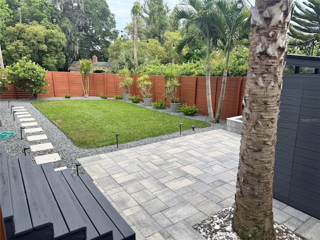 view of patio featuring a fenced backyard