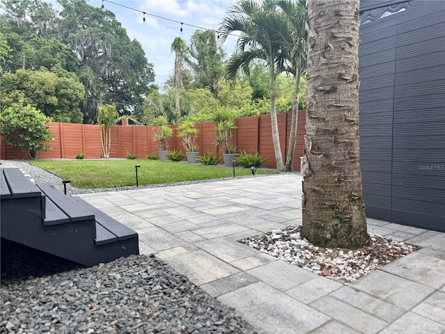 view of patio featuring a fenced backyard