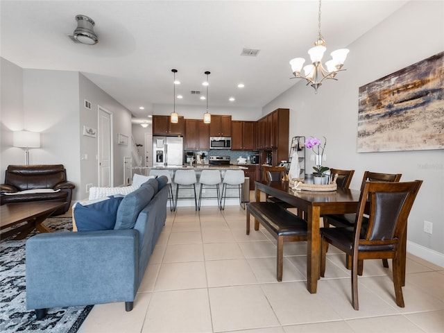 193 Captiva Dr, Davenport, FL 33896 - dining space with a chandelier, visible vents, light tile patterned floors, and recessed lighting