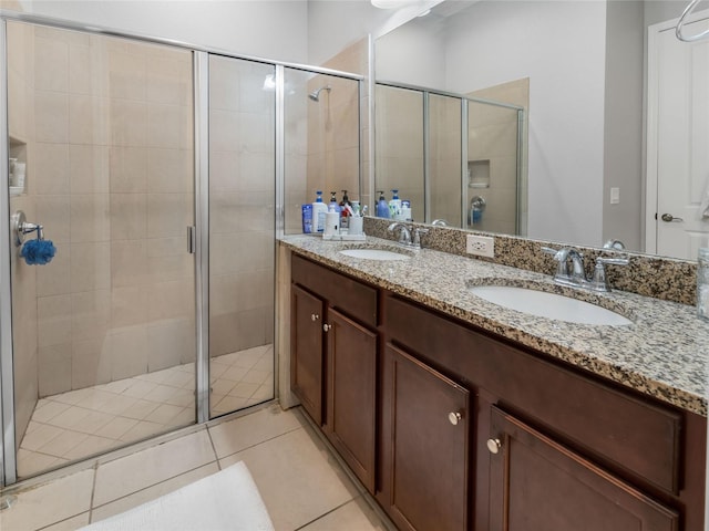193 Captiva Dr, Davenport, FL 33896 - full bathroom featuring double vanity, a sink, and a shower stall