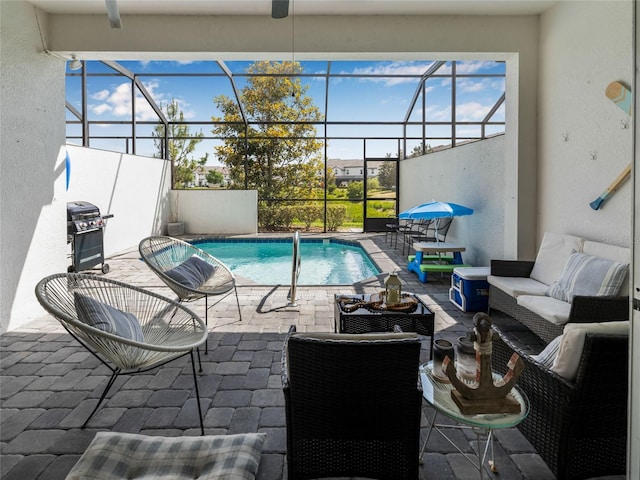 193 Captiva Dr, Davenport, FL 33896 - outdoor pool with grilling area, a patio, a lanai, and an outdoor hangout area