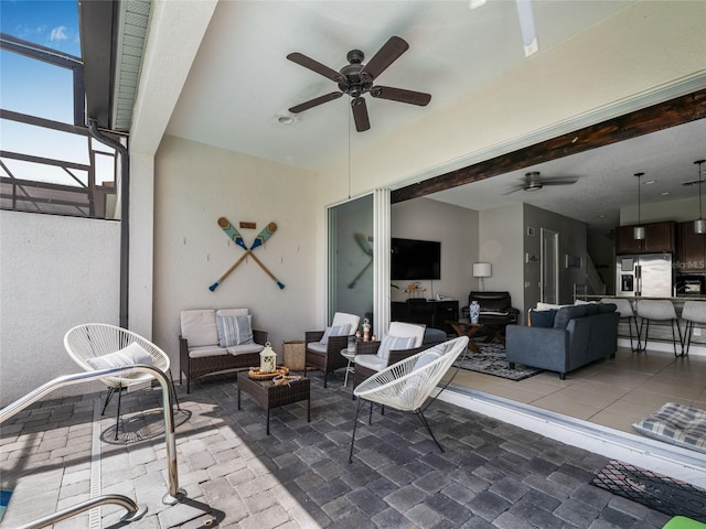 193 Captiva Dr, Davenport, FL 33896 - view of patio with an outdoor living space, a ceiling fan, and a lanai
