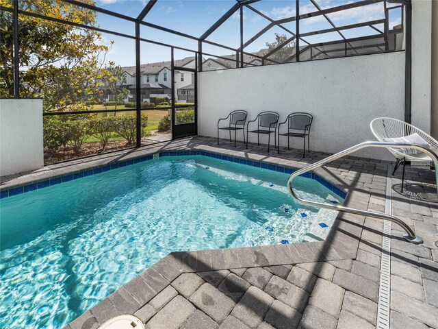 193 Captiva Dr, Davenport, FL 33896 - view of swimming pool with a patio, a lanai, and a pool