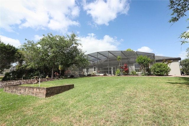view of yard featuring a lanai
