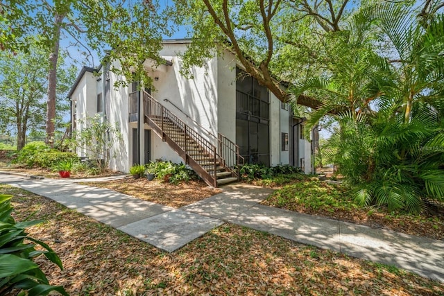 150 Waterfall Way Unit 102, Altamonte Springs, FL 32714 - exterior space with stairway and stucco siding