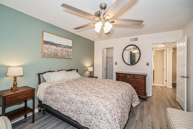 150 Waterfall Way Unit 102, Altamonte Springs, FL 32714 - bedroom featuring visible vents, ceiling fan, wood finished floors, and baseboards