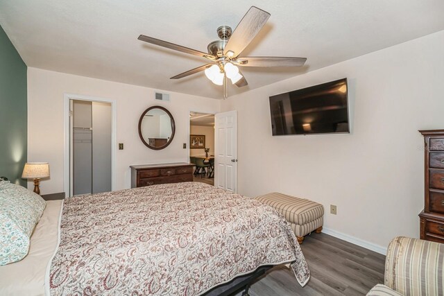 150 Waterfall Way Unit 102, Altamonte Springs, FL 32714 - bedroom featuring a ceiling fan, visible vents, wood finished floors, and baseboards