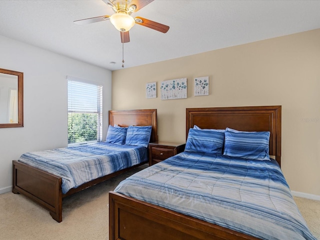 411 Cabello Dr, Davenport, FL 33837 - carpeted bedroom featuring baseboards and a ceiling fan