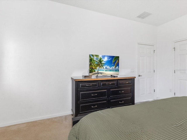 411 Cabello Dr, Davenport, FL 33837 - bedroom with baseboards, light carpet, and visible vents