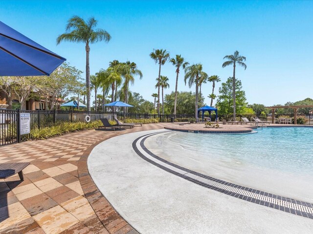 411 Cabello Dr, Davenport, FL 33837 - community pool with fence