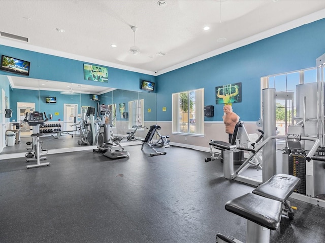 411 Cabello Dr, Davenport, FL 33837 - gym featuring crown molding, recessed lighting, a ceiling fan, baseboards, and visible vents