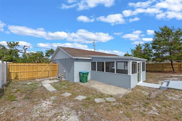 2763 E Waco Dr, Deltona, FL 32738 - rear view of house featuring a sunroom and a fenced backyard