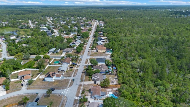 2763 E Waco Dr, Deltona, FL 32738 - aerial overview of property's location with a heavily wooded area and nearby suburban area