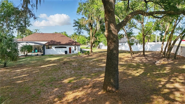 view of yard featuring fence