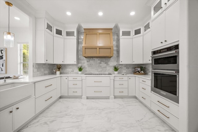 kitchen with stainless steel double oven, custom exhaust hood, light marble finish flooring, decorative backsplash, and recessed lighting