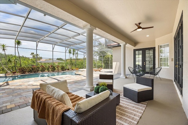 view of patio / terrace featuring french doors, an outdoor hangout area, a ceiling fan, and an outdoor pool