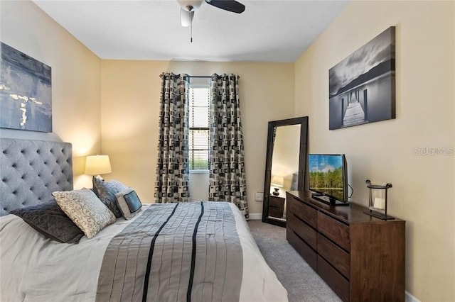 1425 Thunderbird Rd, Davenport, FL 33896 - carpeted bedroom with baseboards and ceiling fan