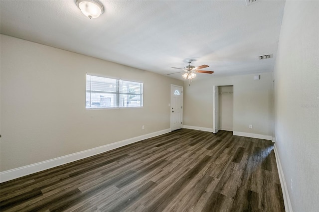 72 Campus View Dr, Orlando, FL 32810 - interior space featuring visible vents, baseboards, ceiling fan, and dark wood-style floors