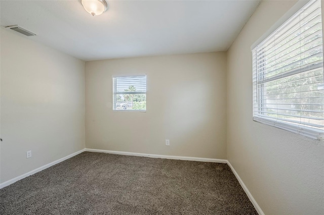 72 Campus View Dr, Orlando, FL 32810 - carpeted empty room featuring baseboards and visible vents