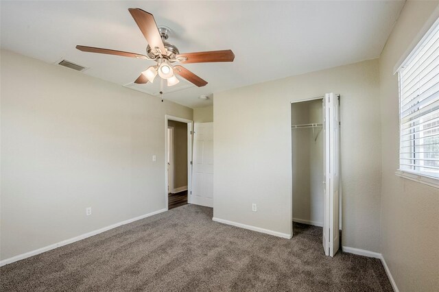72 Campus View Dr, Orlando, FL 32810 - unfurnished bedroom with carpet floors, baseboards, a closet, and visible vents