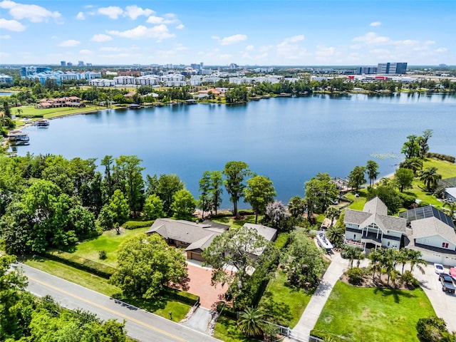 bird's eye view featuring a water view and a city view