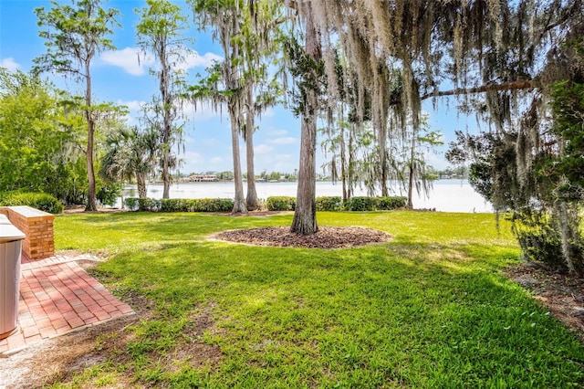view of yard with a water view