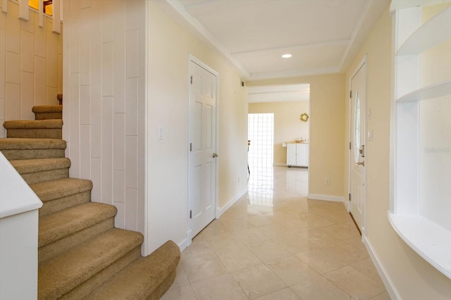 hallway featuring light tile patterned floors, recessed lighting, stairway, and baseboards