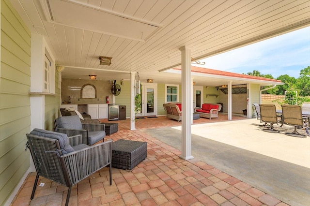 view of patio / terrace featuring an outdoor living space and outdoor dining area