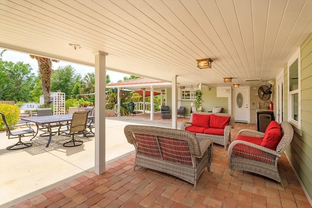 36408 E Eldorado Lake Dr, Eustis, FL 32736 - view of patio / terrace featuring an outdoor living space and outdoor dining area