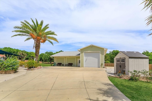 36408 E Eldorado Lake Dr, Eustis, FL 32736 - detached garage featuring a storage shed and driveway