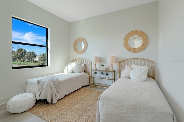 bedroom featuring wood finished floors