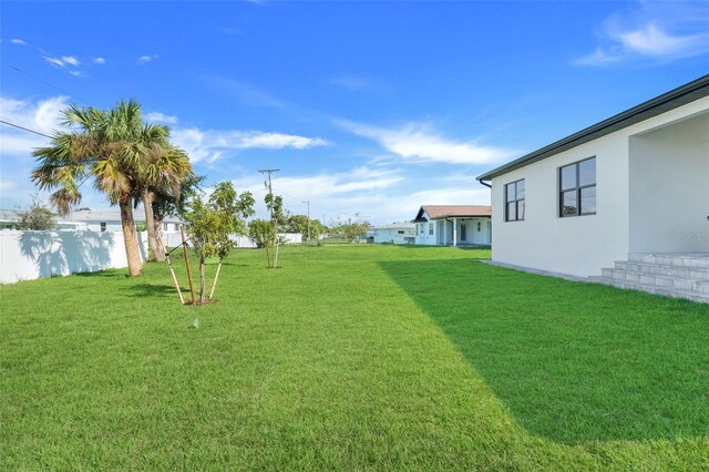 view of yard with fence