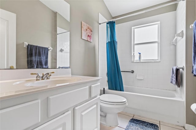 bathroom featuring shower / bathtub combination with curtain, toilet, tile patterned flooring, and vanity