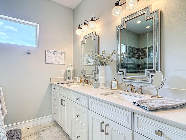 full bath with double vanity and a sink