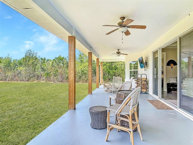 view of patio featuring a ceiling fan