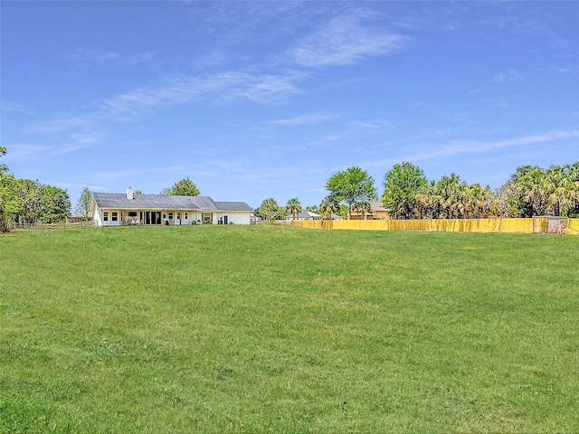 view of yard with fence
