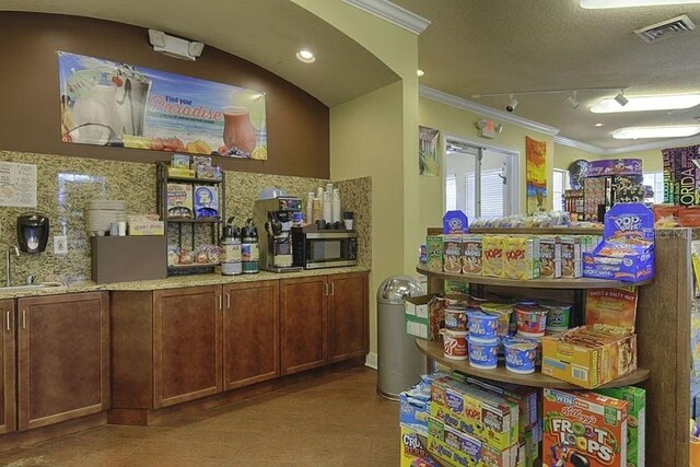 2302 Butterfly Palm Way Unit 105, Kissimmee, FL 34747 - interior space with visible vents and a sink