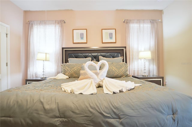 bedroom featuring multiple windows