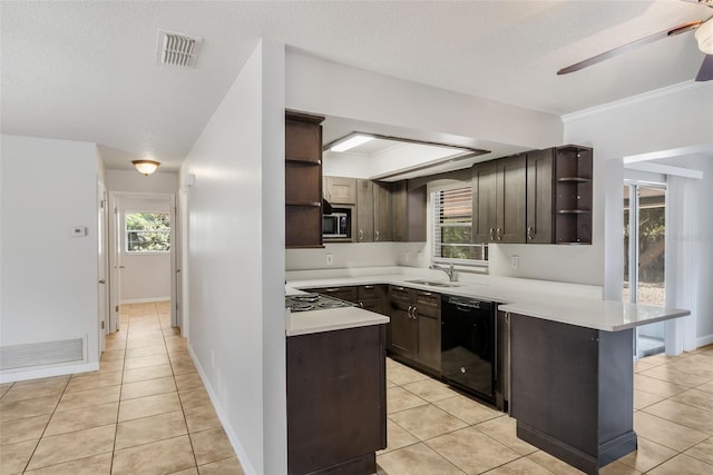 1051 Arden St, Longwood, FL 32750 - kitchen with dark brown cabinets, open shelves, black dishwasher, a peninsula, and visible vents