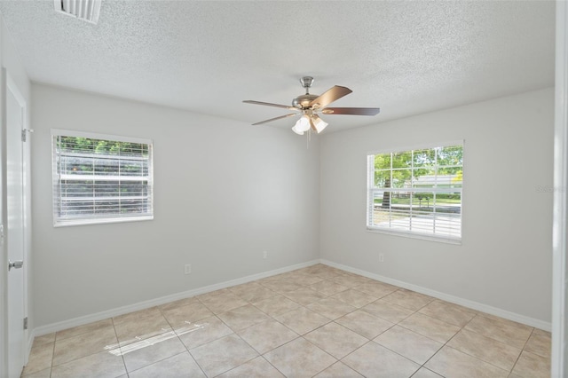 1051 Arden St, Longwood, FL 32750 - spare room with a ceiling fan, a textured ceiling, visible vents, and a wealth of natural light