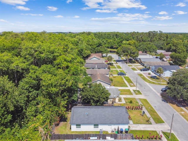 aerial view featuring a view of trees