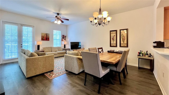 dining area with baseboards, dark wood finished floors, and a wealth of natural light